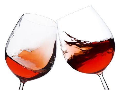 pair of moving wine glasses over a white background, cheers!