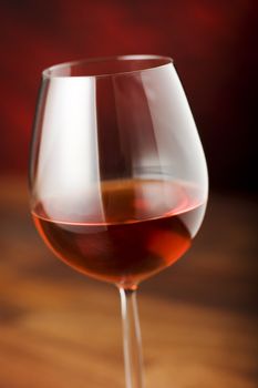 red wine glass over a dark background