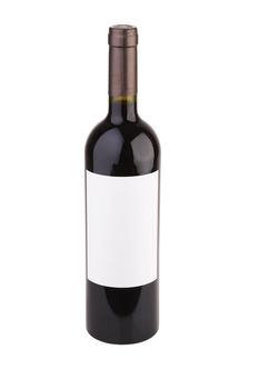 Isolated red wine bottle on white background with clipping path.