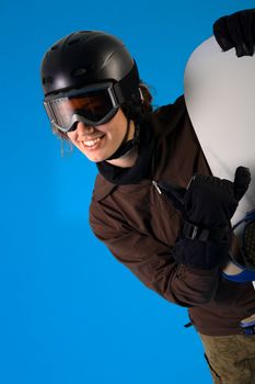 Snowboarder in full equipment making the hang loose sign