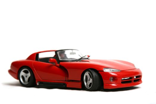 Isolated red sports car on a white background