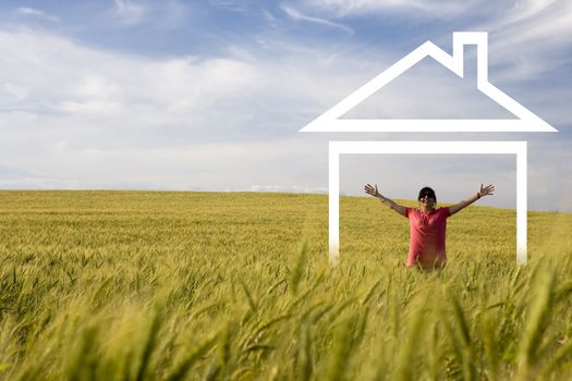 young happy woman in the middle of the field enjoying new house