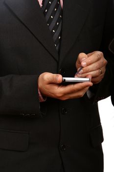 business man in blue suit working on pda or smartphone

