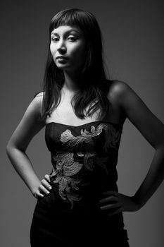 young black hair woman portrait on dark background

