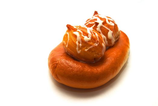 photo of the bagel and cookies on white background