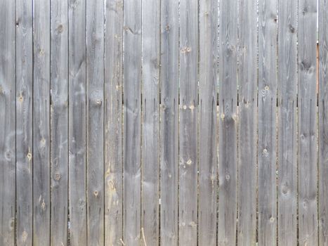 Fence from wooden boards 