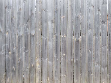 Fence from wooden boards 