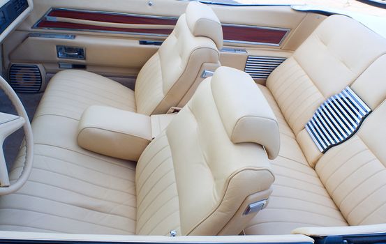 classic old cabriolet interior, with white lether passenger compartment