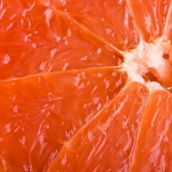 Ripe grapefruit slice close up