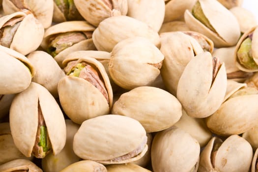 Pile of pistachio nuts close up