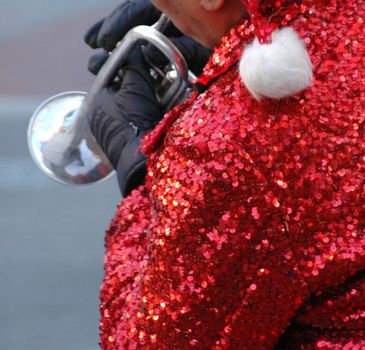 African american man playing on the streets during the christmas holidays.