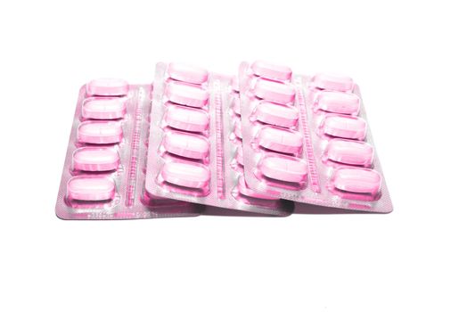 photo of the packings of pills on white background