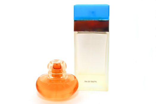 two bottles of perfume on white background