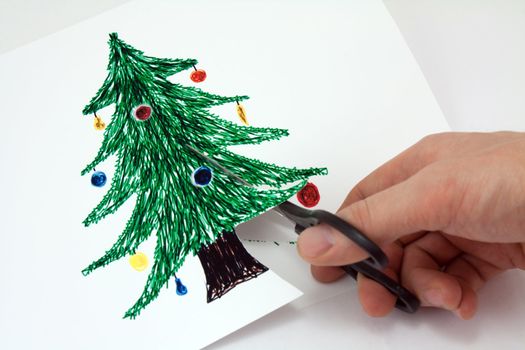 Cut with scissors Christmas tree of paper