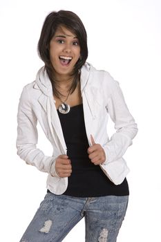 portrait of a teenager girl against white background in fashion with an expression of extreme happiness