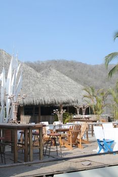 Beach cabana restaurant with nice tropical setting