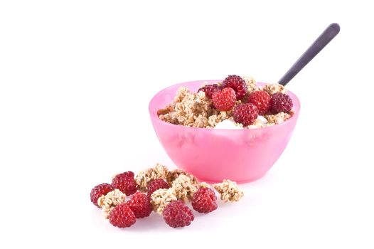 A bowl filled with curds, cereal and fresh raspberries, isolated on white.