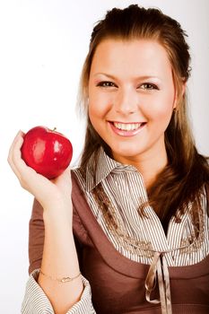  beautiful young smiling woman with red apple.
