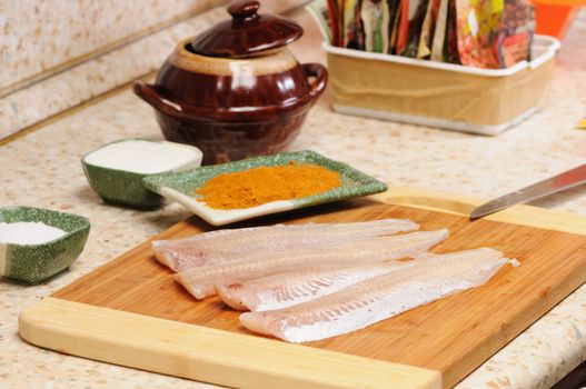 Meal preparation on kitchen from a fish