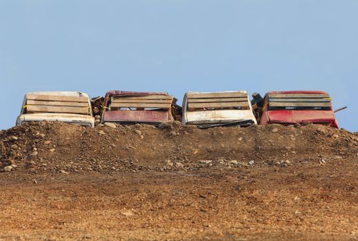 Obstacle made of old cars on an off-road race track. 