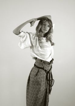 The beautiful young blonde in a white jacket. b/w