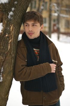Portrait of the young man in the winter