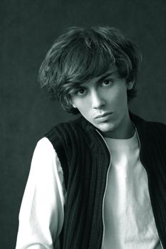 Portrait of the young man with a magnificent hairdress