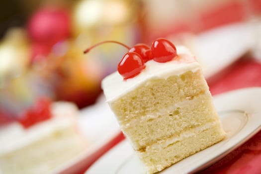 Delicious piece of cake with cherries