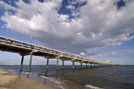 Endless pier running to the sea in Sardinian Cagliari