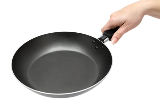 Woman holding a black frying pan. Isolated on a white background.