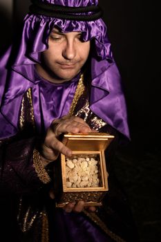 Magi with a  golden box filled with Frankincense.   Frankincense is the hardened resin of the Boswellia tree. This is frankincense from Omani which is said to be the best in the world.  Has a beautiful spicy warm citrusy long lasting aroma.  Focus to frankincense resin only.