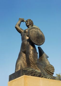 Symbol of the Warsaw city. Symbolic bronze monument made hundred years ago.