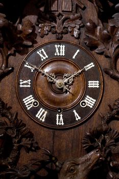 Close-up on an old german cuckoo clock.