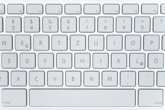 Top view on a white computer keyboard.