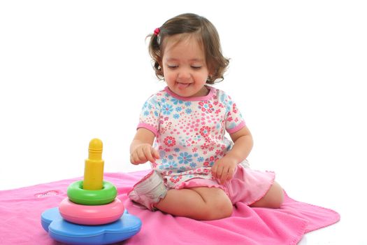 Little girl playing and having fun with generic toy. More pictures of this baby at my gallery
