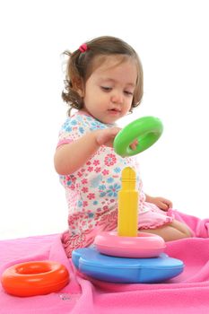 Little girl playing and having fun with generic toy. More pictures of this baby at my gallery
