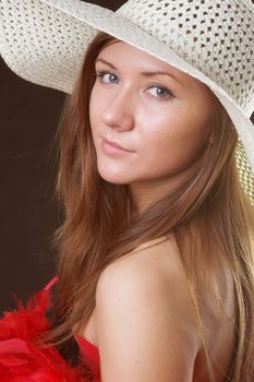 young  girl wearing a white hat
