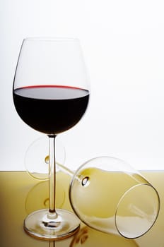 Pair of wine glasses on white background