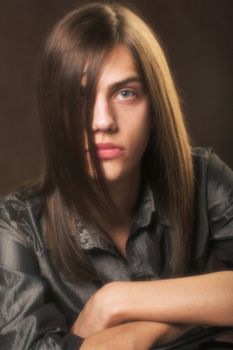 young man with long hair