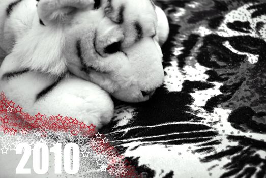 2010 The Year of the White Tiger Background with Furry Little Tiger Toy over Tiger Face Texture