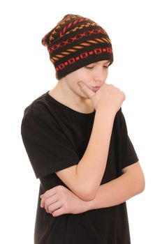 The teenager in a black vest and a hat isolated on white background