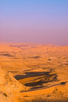 Meandering Road In Sand Hills Of Negev Desert, Sunset