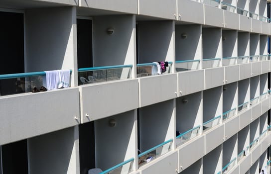 Rows Of Many White Balconies Of Modern Building