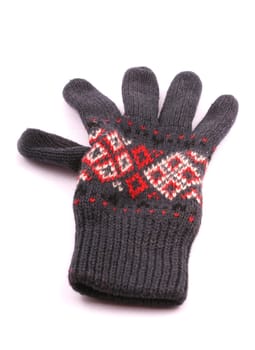 gray woolen glove with white and red ornaments on white background