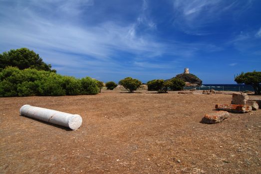 Ancient Sardinian ruins of Nora with sea and lighthouse