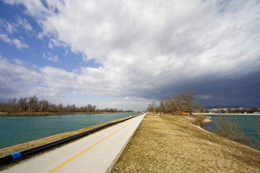 Path around the lakes with clouds