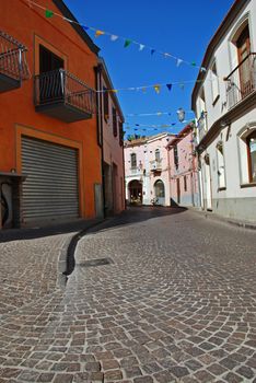 Narrow Italian street with paving during siesta