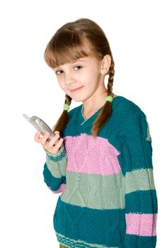 The girl in a color sweater holds mobile phone in a hand