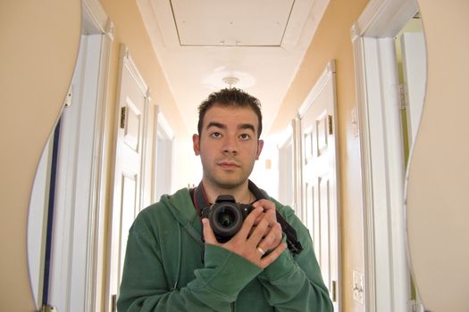 This is me - my self portrait.  I faced the curvy mirror at the end of the hallway.  Backlit lighting coming from the other end of the house. 