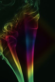 smoke with colors in black background